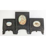 INDIAN MINIATURES, a set of three, ornate carved wood frames, largest 14.5cm x 9.5cm overall. (3)