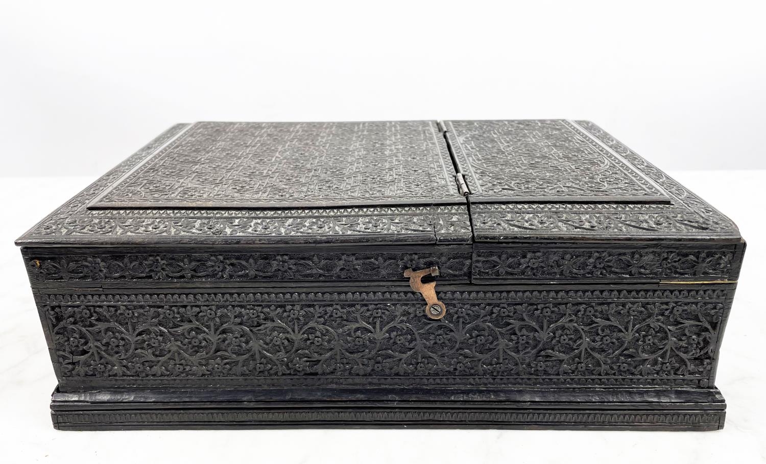 JEWELLERY BOX, 19th century Anglo-Indian ornately carved ebony with hinged lid and fitted - Image 3 of 8