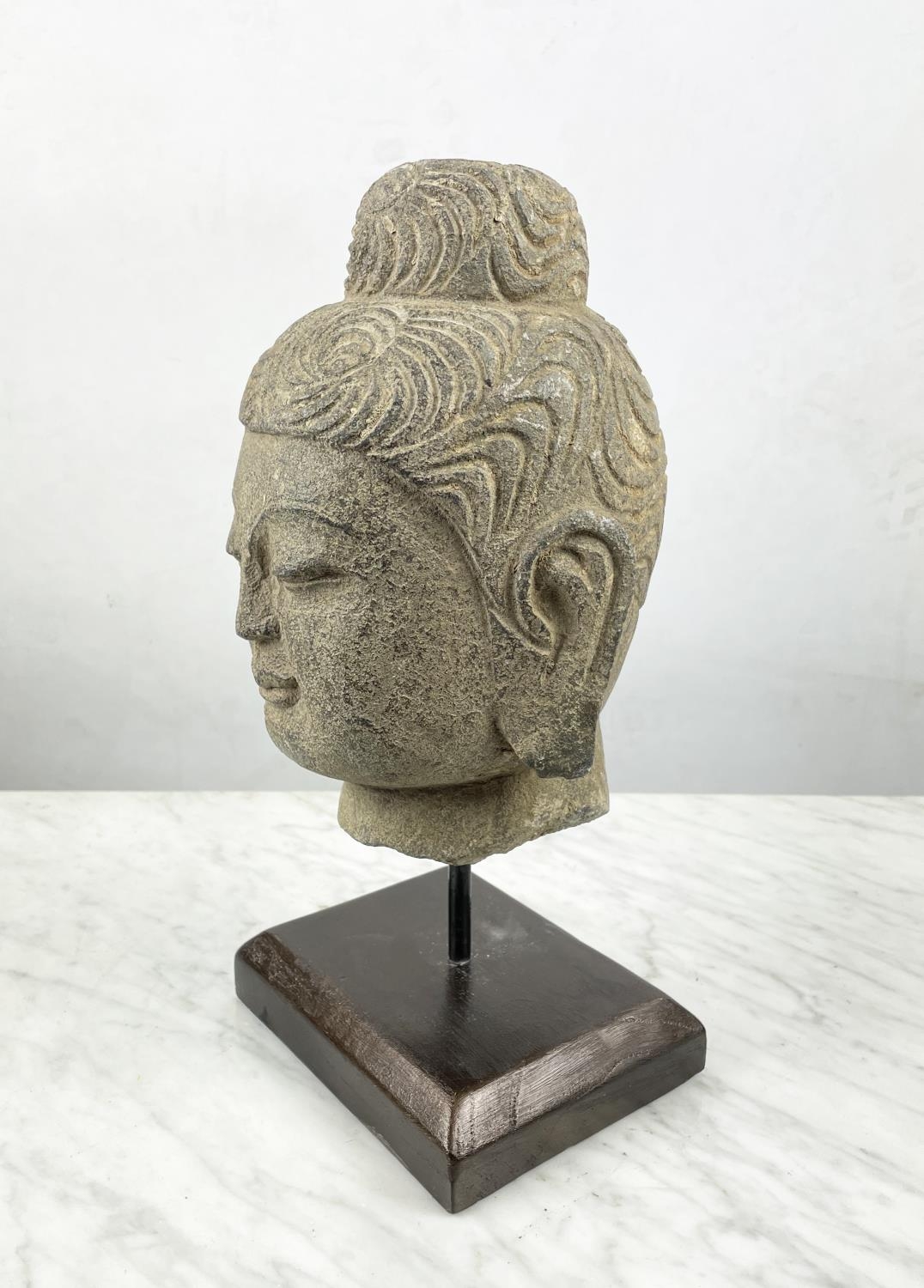 A CARVED STONE BUDDHA HEAD ON STAND, an Oriental wood figure and a glazed pottery figure along - Image 4 of 7