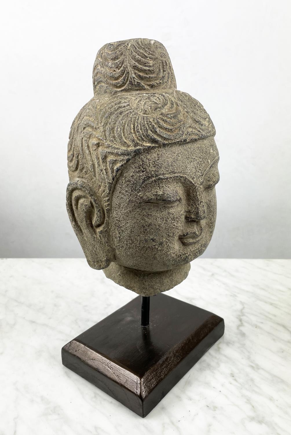 A CARVED STONE BUDDHA HEAD ON STAND, an Oriental wood figure and a glazed pottery figure along - Image 2 of 7