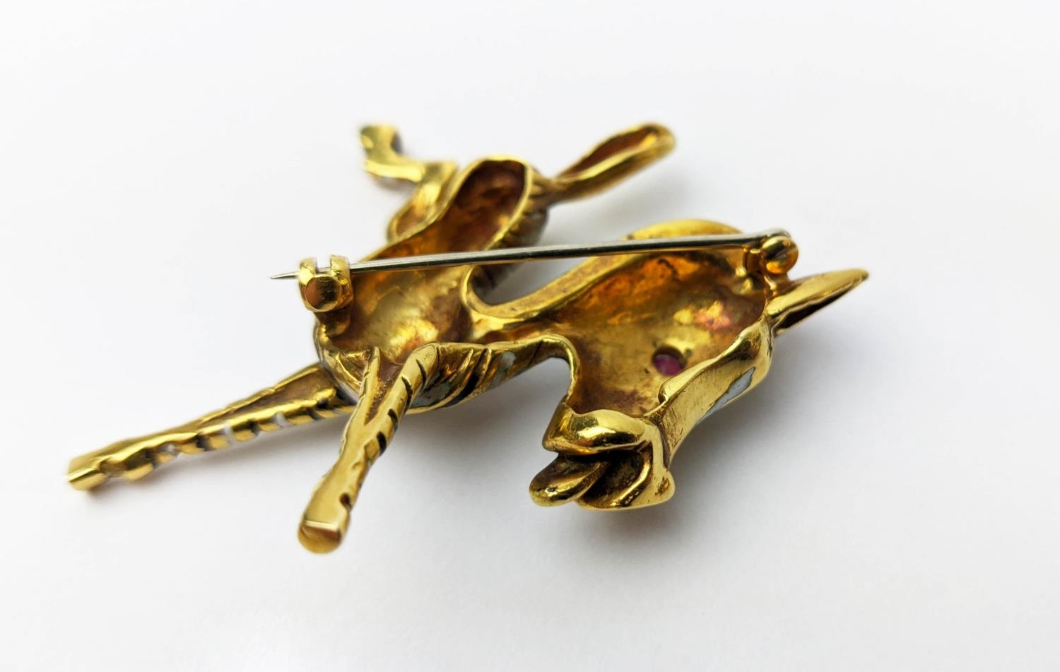 AN 18CT GOLD FAWN BROOCH, enamelled body, set with a ruby eye, 20.66 grams. - Image 4 of 8