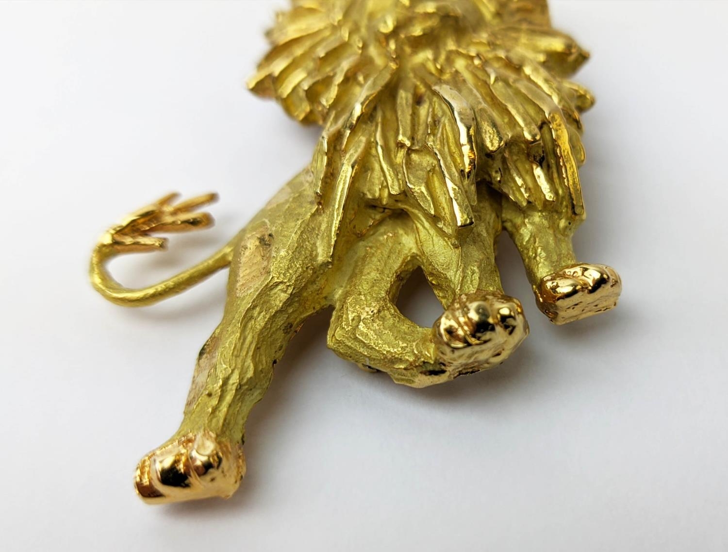 AN 18CT GOLD 'CHAUMET' LION BROOCH, textured finish, made in parts, 33.38 grams, probably 1970s. - Image 6 of 9