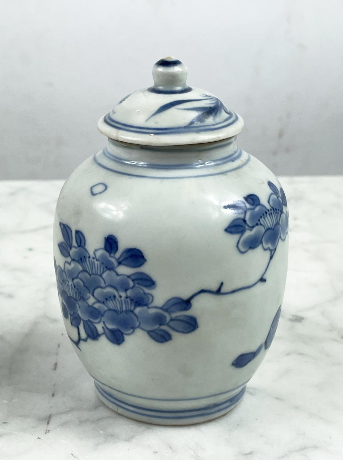 HATCHER CARGO SMALL LIDDED VASES, a pair, in blue and white foliate decoration, 13cm H. (2) - Image 2 of 7