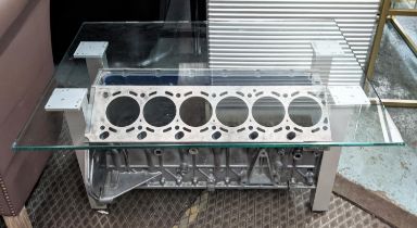 LOW TABLE, 60cm D x 43cm H x 80cm H , glass top on an engine base.