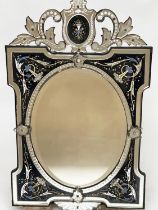VENETIAN WALL MIRROR, early 20th century etched blue and clear glass with oval centre and shield