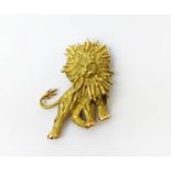 AN 18CT GOLD 'CHAUMET' LION BROOCH, textured finish, made in parts, 33.38 grams, probably 1970s.