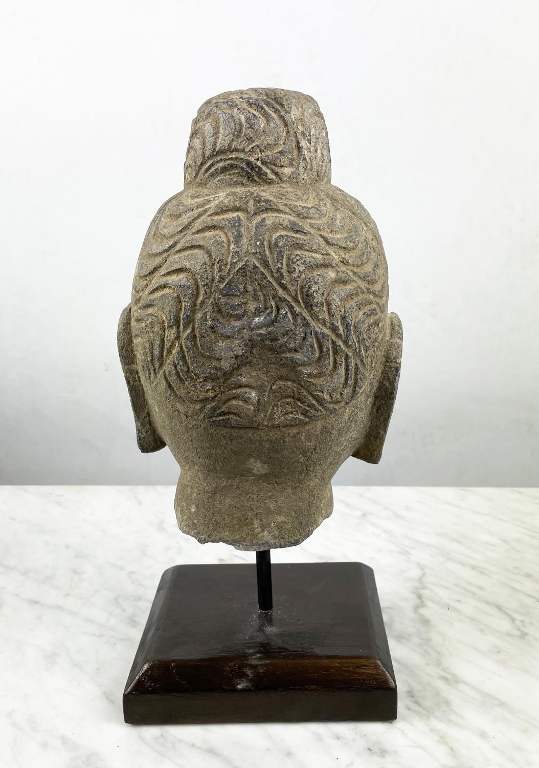 A CARVED STONE BUDDHA HEAD ON STAND, an Oriental wood figure and a glazed pottery figure along - Image 3 of 7