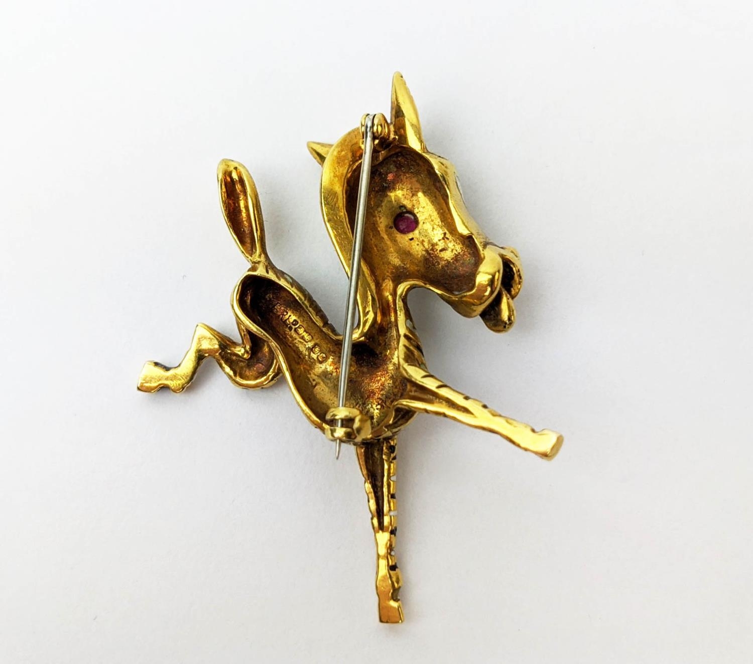 AN 18CT GOLD FAWN BROOCH, enamelled body, set with a ruby eye, 20.66 grams. - Image 3 of 8