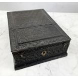 JEWELLERY BOX, 19th century Anglo-Indian ornately carved ebony with hinged lid and fitted
