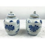 HATCHER CARGO SMALL LIDDED VASES, a pair, in blue and white foliate decoration, 13cm H. (2)