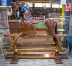 STEVENSON BROTHERS ROCKING HORSE, 123cm H x 143cm L x 46cm W.