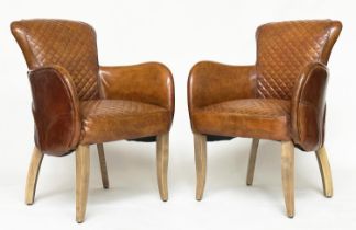 SADDLE CHAIRS BY TIMOTHY OULTON, a pair, cross stitched mid tan brown leather upholstered each