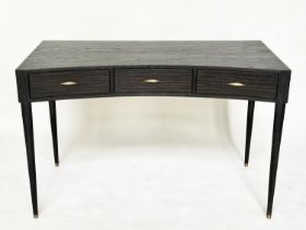 JULIAN CHICHESTER 'PERCY' WRITING TABLE, ebonised oak, concave with three frieze drawers, 120cm W