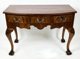 BOWFRONT WRITING TABLE, 77cm H x 108cm W x 57cm D, early 20th century mahogany with three drawers.