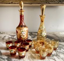LIQUEUR SET, Murano ruby and amber each with decanter and six glasses, (one labelled 'Murano', one