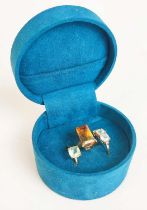 THREE 9CT GOLD DRESS RINGS, comprising a large single stone citrine set ring, size N½; a three stone