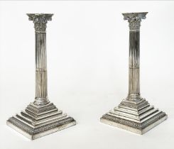 CANDLESTICKS, a pair, silver plated by Richard Hodd and Son of Corinthian column form with stepped