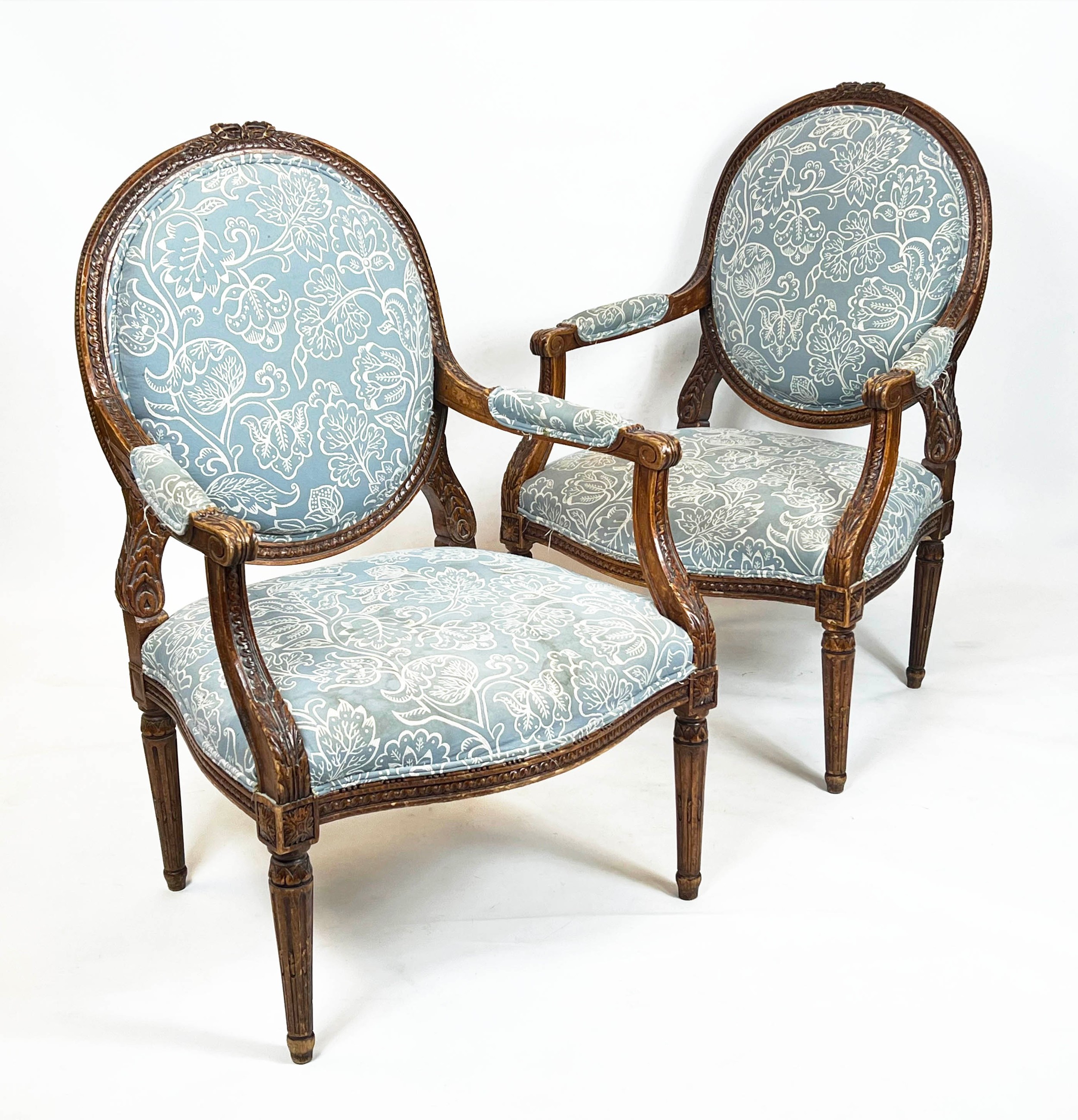 FAUTEUILS, 103cm H x 66cm, a pair, late 19th/early 20th century French beechwood in patterned blue
