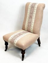 SLIPPER CHAIR, 86cm H x 54cm, Victorian in pink patterned upholstery on castors.