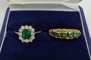 AN EMERALD AND DIAMOND SET DRESS RING, white metal shank, probably 18ct white gold, the central