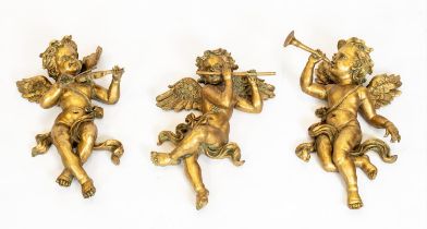 WALL APPLIQUES, 42cm-45cm H, a set of three, gilded musical cherubs. (3)