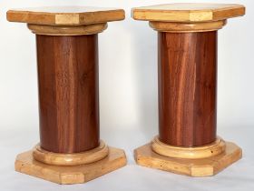 COLUMNS, a pair, mahogany veneered with canted corner tops and plinths, 45cm x 45cm x 80cm H. (2)
