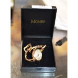 9 CARAT GOLD CASED WRIST WATCH ON 9 CARAT GOLD BRACELET - APPROXIMATE WEIGHT = 18.4 GRAMS