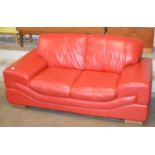MODERN RED LEATHER 2 SEATER SETTEE