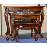 NEST OF 3 ORNATE MAHOGANY STAINED TABLES