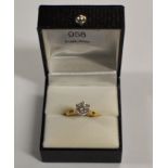 DIAMOND SOLITAIRE RING SET ON 18 CARAT GOLD BAND IN PLATINUM MOUNT - APPROXIMATELY 1 CARAT