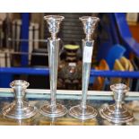 2 PAIRS OF WEIGHTED STERLING SILVER CANDLE STICKS