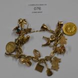 9 CARAT GOLD CHARM BRACELET WITH VARIOUS CHARMS INCLUDING A 1926 SOVEREIGN & CANADIAN GOLD 10