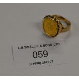 9 CARAT GOLD RING SET WITH A MEXICAN GOLD COIN - APPROXIMATE WEIGHT = 6.7 GRAMS