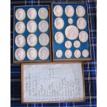 BOXED SET OF 19TH CENTURY CAST PLASTER CAMEO DISPLAY PLAQUES DEPICTING ROMAN EMPERORS WITH PAPER