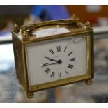 SMALL BRASS CASED CLOCK