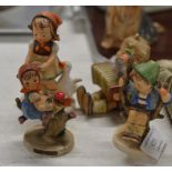 4 VARIOUS HUMMEL FIGURINES