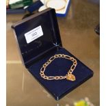 9 CARAT GOLD BRACELET WITH HEART SHAPED PADLOCK - APPROXIMATE WEIGHT = 9.7 GRAMS