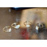 4 VARIOUS 9 CARAT GOLD DRESS STONE RINGS - APPROXIMATE COMBINED WEIGHT = 5.5 GRAMS