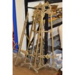 4 LARGE ORNATE GILT METAL EASEL STANDS