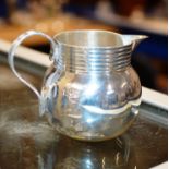 ART DECO STERLING SILVER CREAM JUG, WITH LONDON ASSAY MARKS & DATE LETTER FOR 1915, MAKER MARK