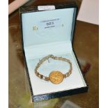 9 CARAT GOLD BRACELET SET WITH A 1906 SOVEREIGN - APPROXIMATE WEIGHT = 13 GRAMS
