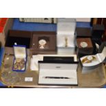 TRAY WITH BOXED MONT BLANC PEN, VARIOUS COSTUME WRIST WATCHES, FOOTBALL BADGES, COMMEMORATIVE