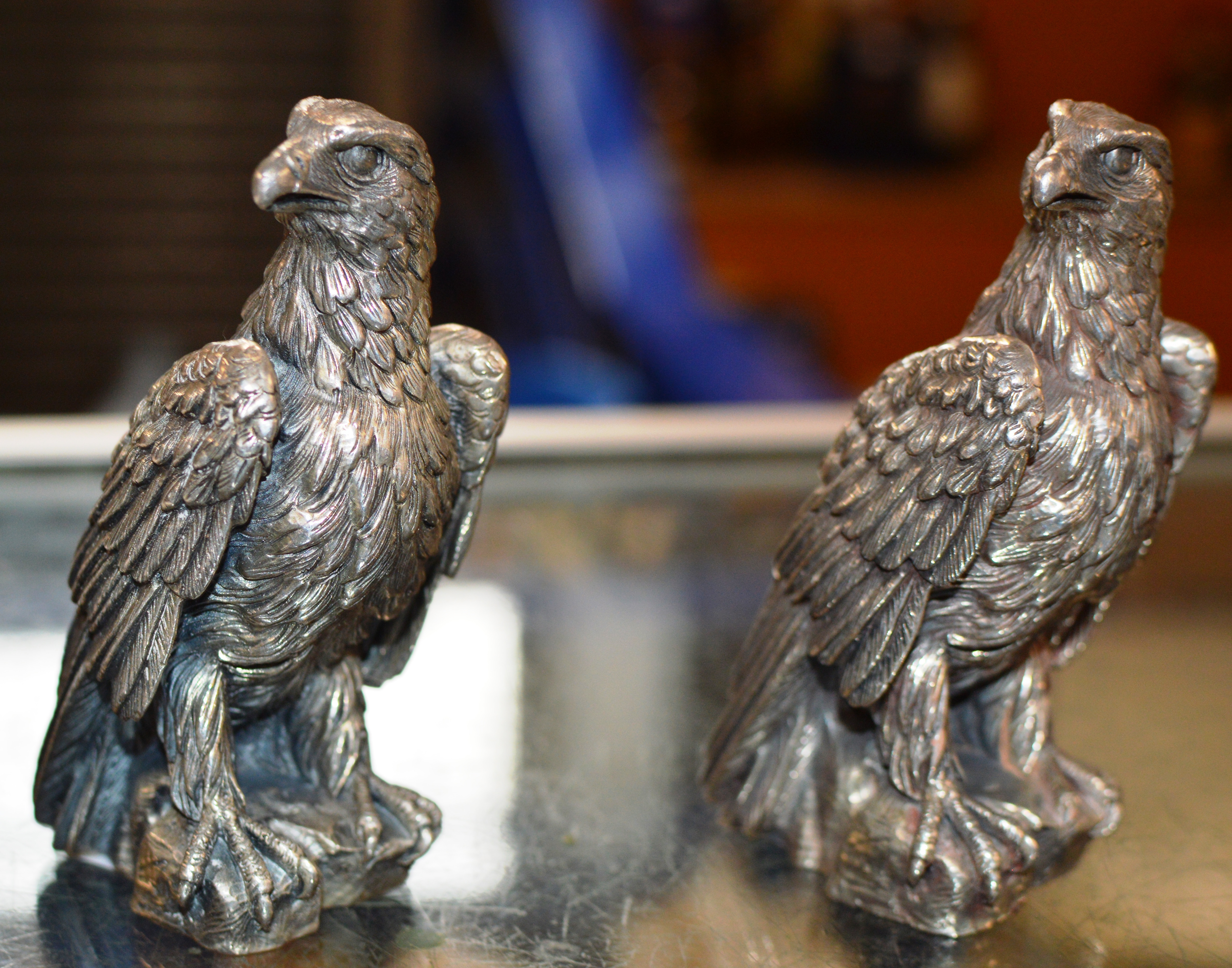 PAIR OF ORNATE SILVER PLATED EAGLE ORNAMENTS