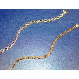 9 CARAT GOLD TENNIS STYLE BRACELET - APPROXIMATE WEIGHT = 6.5 GRAMS & 14 CARAT GOLD TENNIS STYLE