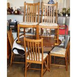ERCOL CIRCULAR DINING TABLE WITH 6 MATCHING CHAIRS