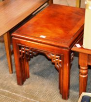 NEST OF 3 ORIENTAL STYLE MAHOGANY STAINED TABLES