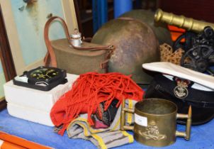 VARIOUS MILITARY MEMORABILIA, TRENCH ART CUP, OLD HELMETS, WATER CANTEEN, COMPASS ETC