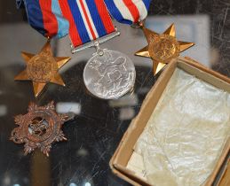 GROUP OF 3 WORLD WAR 2 MEDALS & MILITARY BADGE