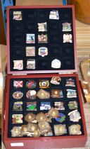 BOX WITH VARIOUS BADGES