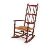 ERNEST GIMSON (BRITISH 1864-1919) ROCKING CHAIR, CIRCA 1904-10